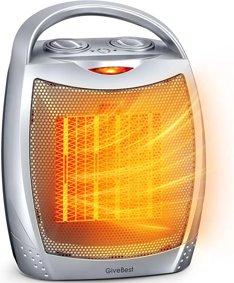 The GiveBest ceramic space heater with its element glowing amber and carry handle