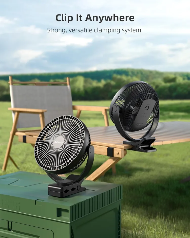Maker graphic 'Clip it anywhere': one fan clipped to a green cooler lid and one clipped to a wooden camp table, grass and sky behind